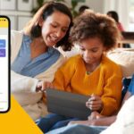 Family looking at device next to BrightCanary child safety app screenshot