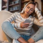 stressed teen looking at phone