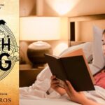 Teen girl reading Fourth Wing in bed