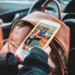 teen scrolling instagram while sitting in car