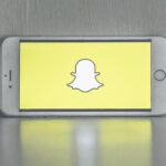 snapchat logo on phone screen